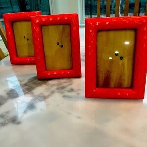 A set of three stunning picture frames in happy orange!